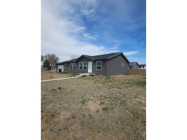 113 Juniper Cir, Log Lane Village, CO 80705