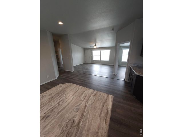 113 Juniper Cir, Log Lane Village, CO 80705