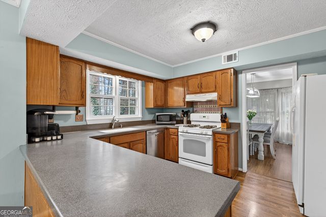 1880 Whispering Willow Way SW, Lilburn, GA 30047