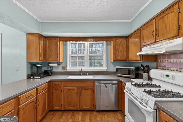 1880 Whispering Willow Way SW, Lilburn, GA 30047