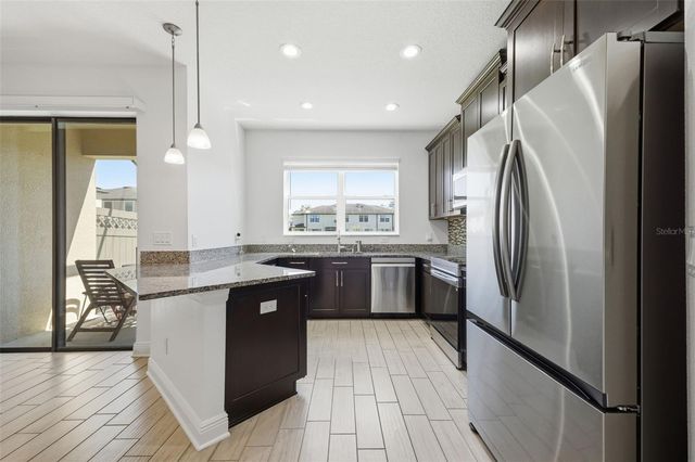 11539 CROWNED SPARROW LANE, Tampa, FL 33626