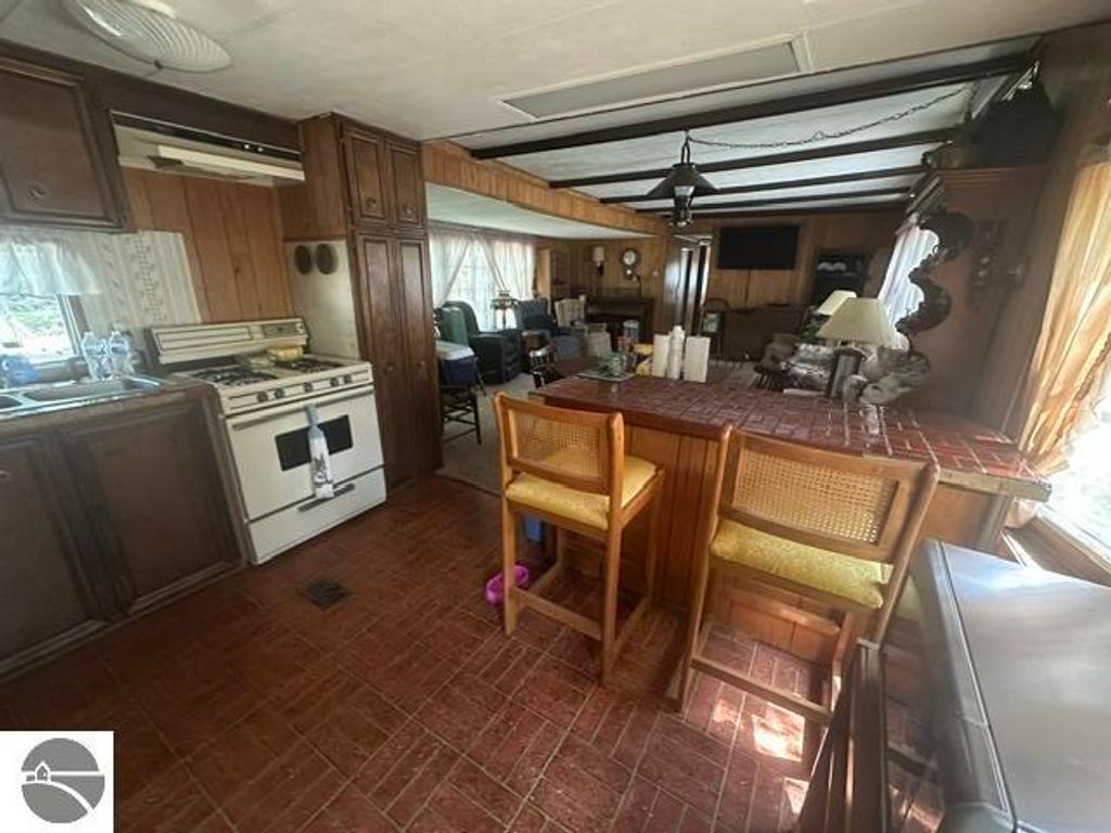 Image 6 of property listing at 7885 N Airpark Road, Weidman, MI 48893
