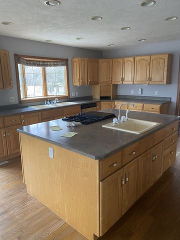 2 Evergreen Drive, Blue Grass, IA 52726