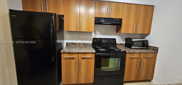 5800 W Sample Rd 103, Coral Springs, FL 33067