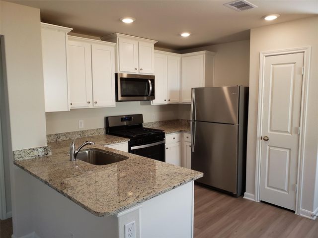 16129 Sugar Falls Drive, Conroe, TX 77303