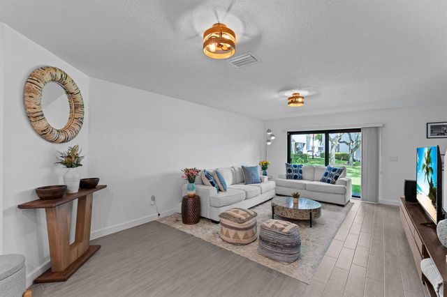 6001 Woods Edge Circle, Riviera Beach, FL 33410