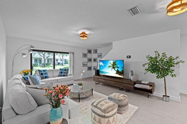 6001 Woods Edge Circle, Riviera Beach, FL 33410