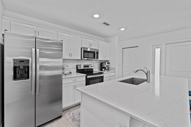 6001 Woods Edge Circle, Riviera Beach, FL 33410
