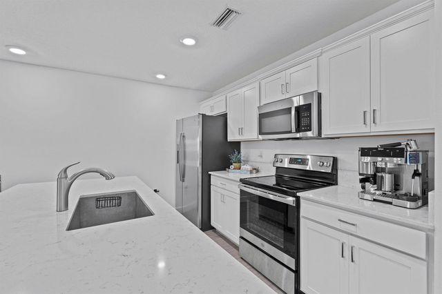 6001 Woods Edge Circle, Riviera Beach, FL 33410