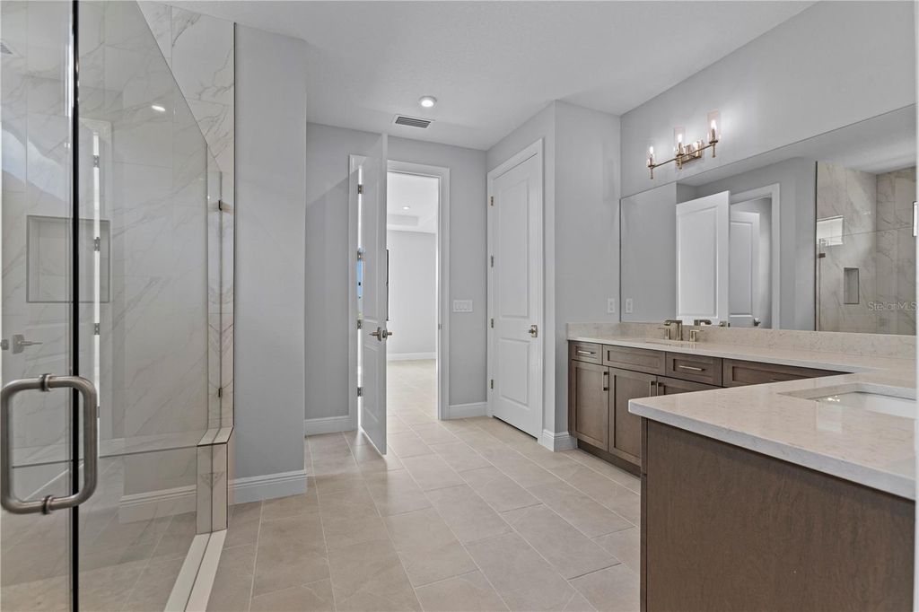 Image 11 of property listing at 14443 COASTAL WOODLAND LANE, Parrish, FL 34219