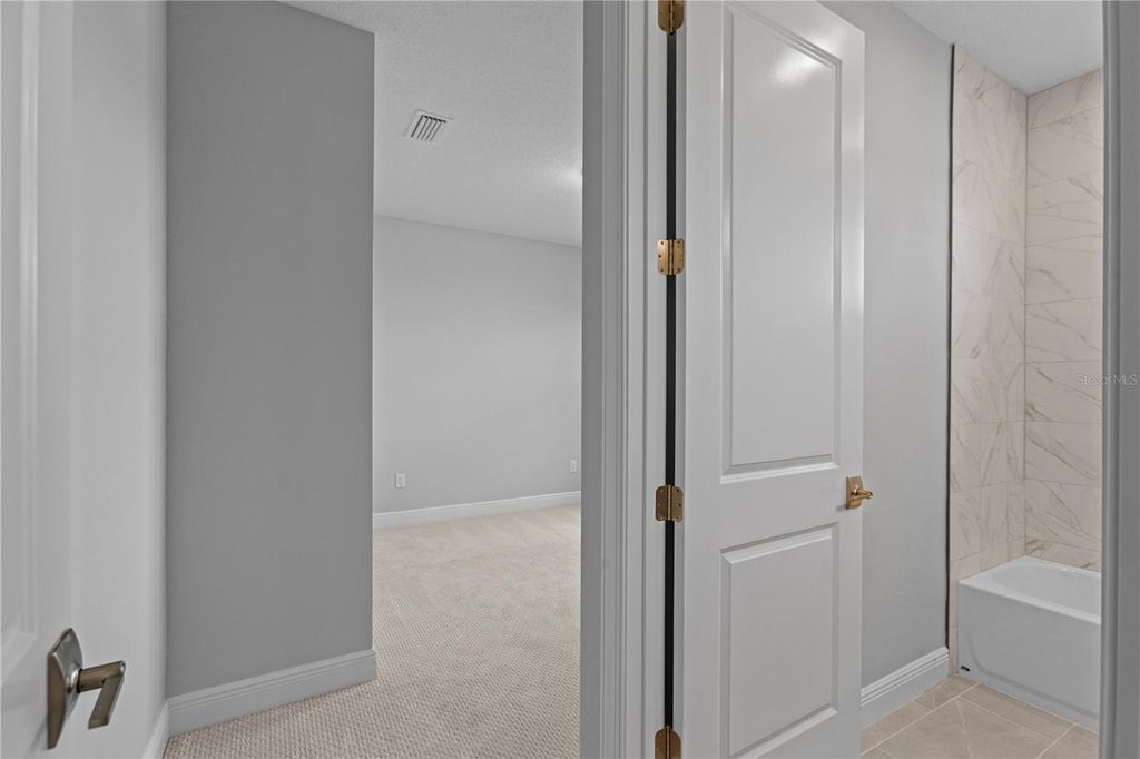 Image 14 of property listing at 14443 COASTAL WOODLAND LANE, Parrish, FL 34219