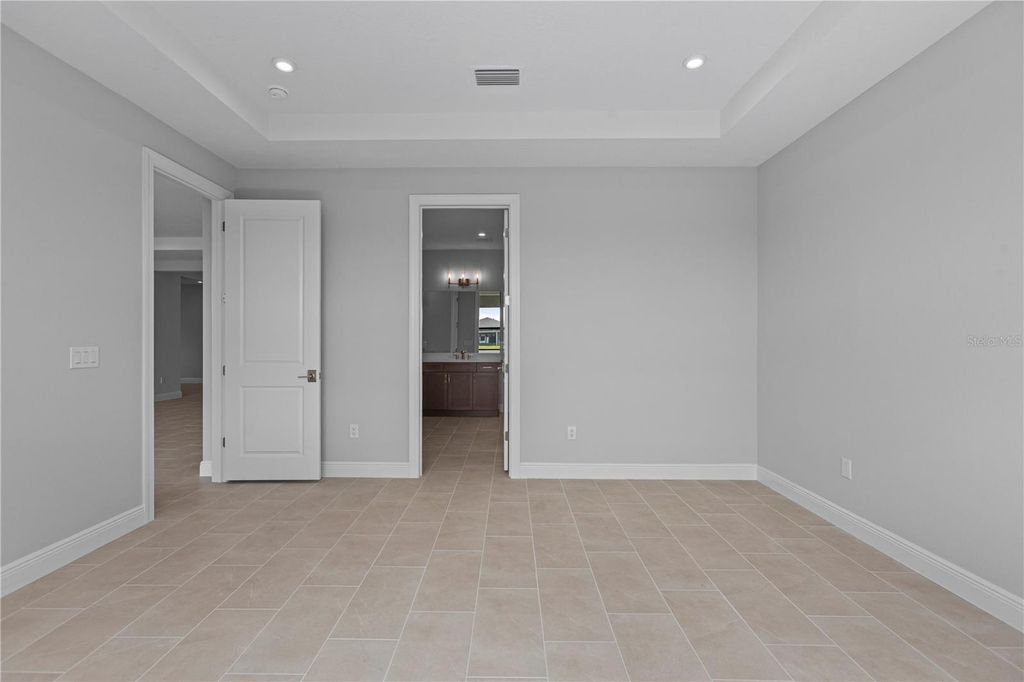 Image 8 of property listing at 14443 COASTAL WOODLAND LANE, Parrish, FL 34219