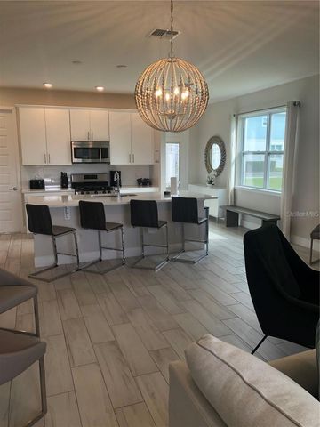 820 DRIVING RANGE COURT, Reunion, FL 34747