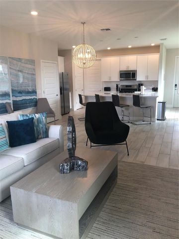 820 DRIVING RANGE COURT, Reunion, FL 34747