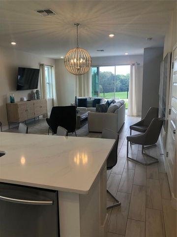 820 DRIVING RANGE COURT, Reunion, FL 34747