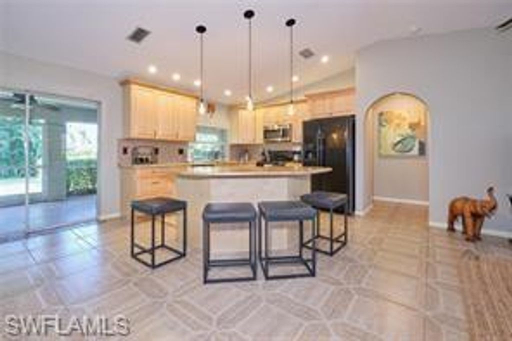 Image 3 of property listing at 140 SE 8th ST, Cape Coral, FL 33990