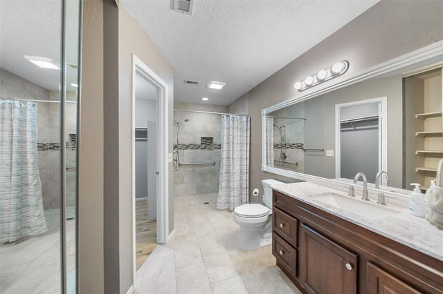 7 Rockridge Court, The Woodlands, TX 77381