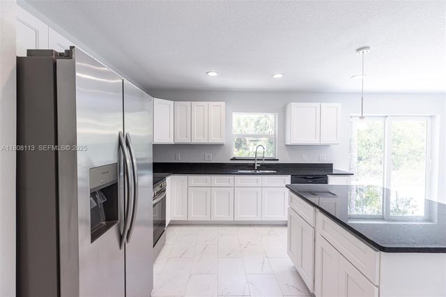 2006 Rosa Court 2006, Lehigh Acres, FL 33972