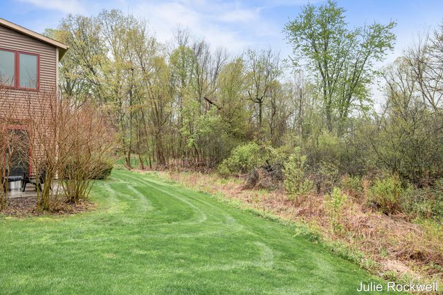 4985 W Village Court SE, Ada, MI 49301