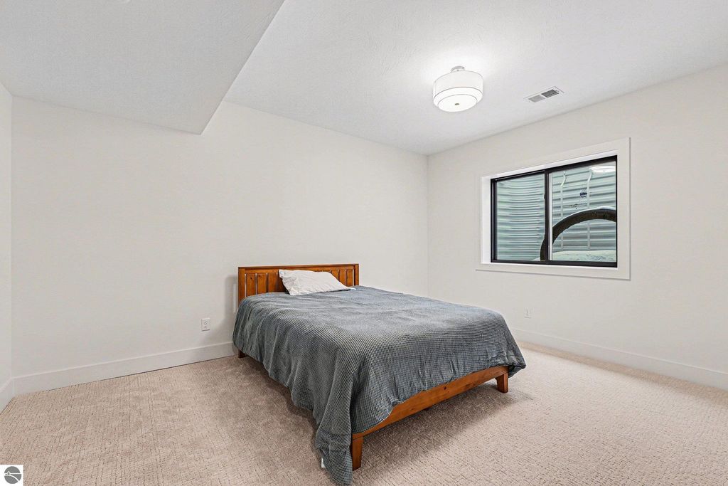 Image 24 of property listing at 1702 Cascade Trail, Traverse City, MI 49685