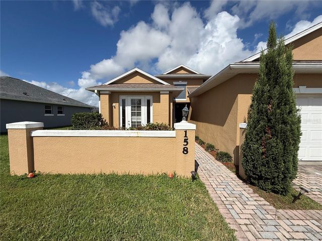 158 MAGIC LANDINGS BOULEVARD, Kissimmee, FL 34744