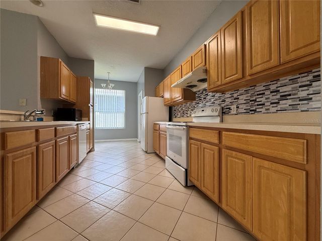 158 MAGIC LANDINGS BOULEVARD, Kissimmee, FL 34744
