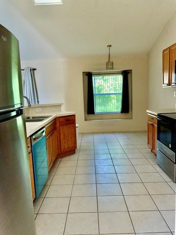 1157 SE Mendavia Avenue, Port St Lucie, FL 34952