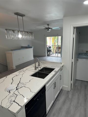 5840 W Sample Rd 302, Coral Springs, FL 33067