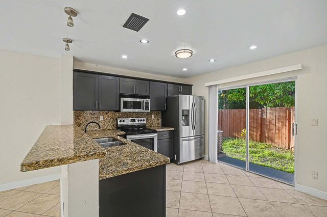 5789 Woodland Point Drive, Tamarac, FL 33319