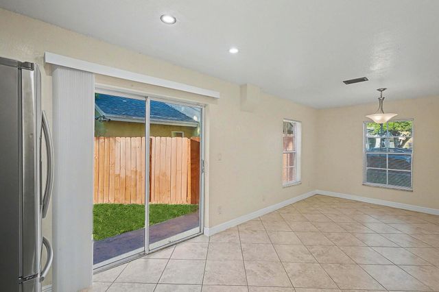 5789 Woodland Point Drive, Tamarac, FL 33319