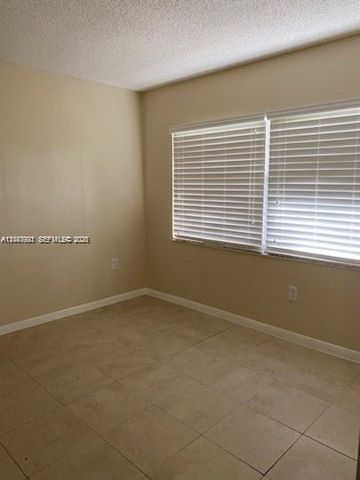 12955 SW 16th Court 113M, Pembroke Pines, FL 33027