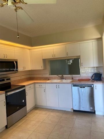 12955 SW 16th Court 113M, Pembroke Pines, FL 33027