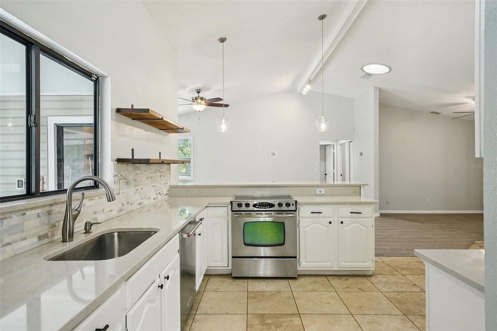 Image 12 of property listing at 3109 LAKE VALENCIA LN E, Palm Harbor, FL 34684