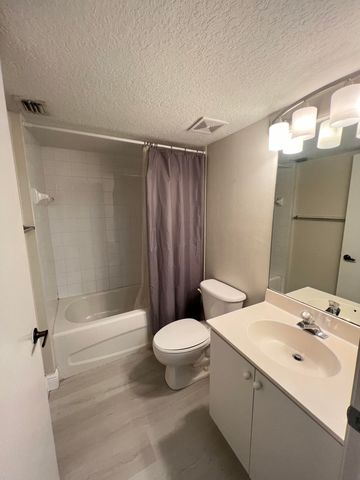 3481 Briar Bay Boulevard 105, West Palm Beach, FL 33411