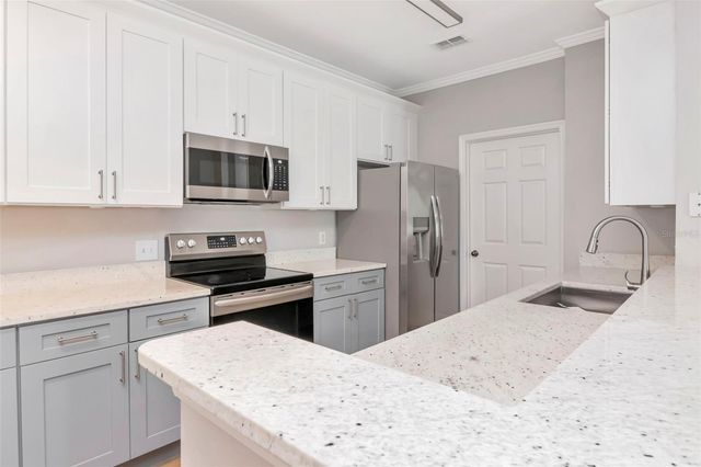 9916 COURTNEY PALMS BOULEVARD 103, Tampa, FL 33619