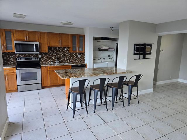 3590 Blue Lake Drive 504, Pompano Beach, FL 33064
