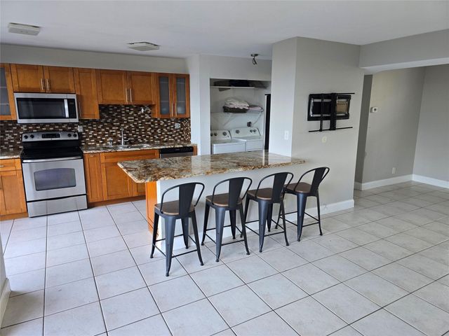 3590 Blue Lake Drive 504, Pompano Beach, FL 33064