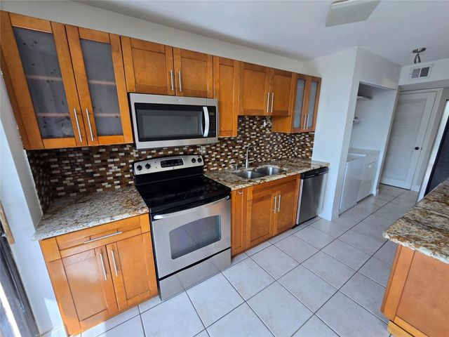 3590 Blue Lake Drive 504, Pompano Beach, FL 33064