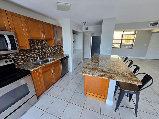 3590 Blue Lake Drive 504, Pompano Beach, FL 33064