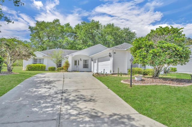 4936 SAWGRASS LAKE CIRCLE, Leesburg, FL 34748