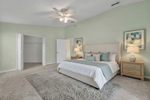 4936 SAWGRASS LAKE CIRCLE, Leesburg, FL 34748