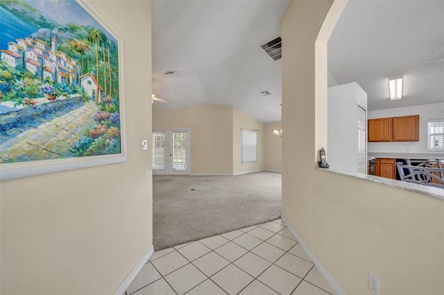 4936 SAWGRASS LAKE CIRCLE, Leesburg, FL 34748