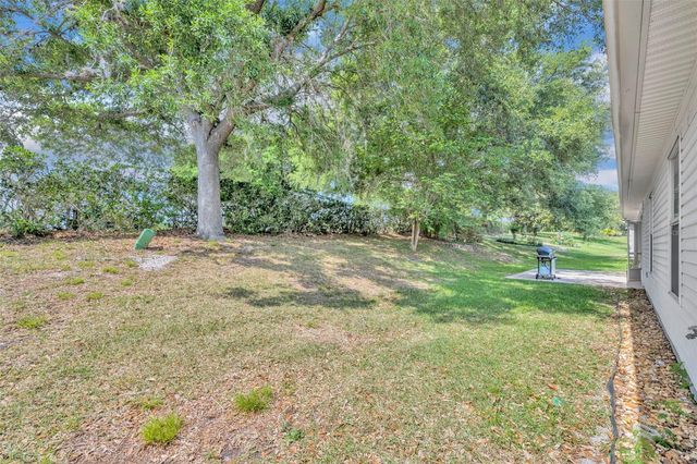 4936 SAWGRASS LAKE CIRCLE, Leesburg, FL 34748