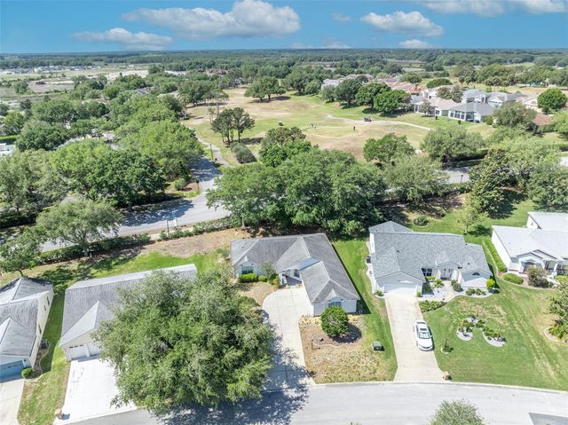 4936 SAWGRASS LAKE CIRCLE, Leesburg, FL 34748