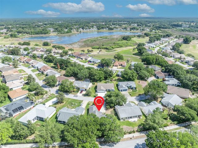 4936 SAWGRASS LAKE CIRCLE, Leesburg, FL 34748