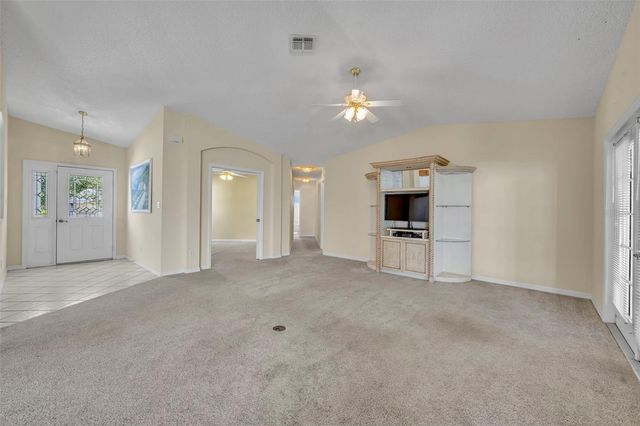 4936 SAWGRASS LAKE CIRCLE, Leesburg, FL 34748