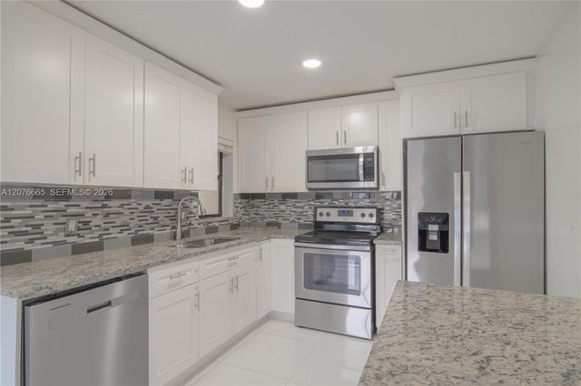 3745 Cocoplum Circle 3561, Coconut Creek, FL 33063