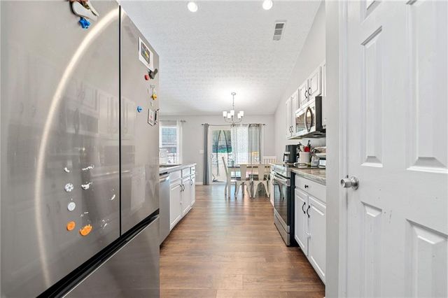 8460 River Hill Commons Drive, Ball Ground, GA 30107