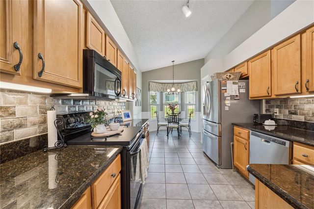 4730 SAWGRASS LAKE CIRCLE, Leesburg, FL 34748