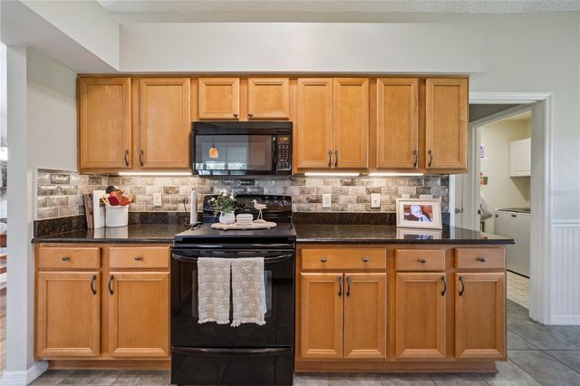 4730 SAWGRASS LAKE CIRCLE, Leesburg, FL 34748